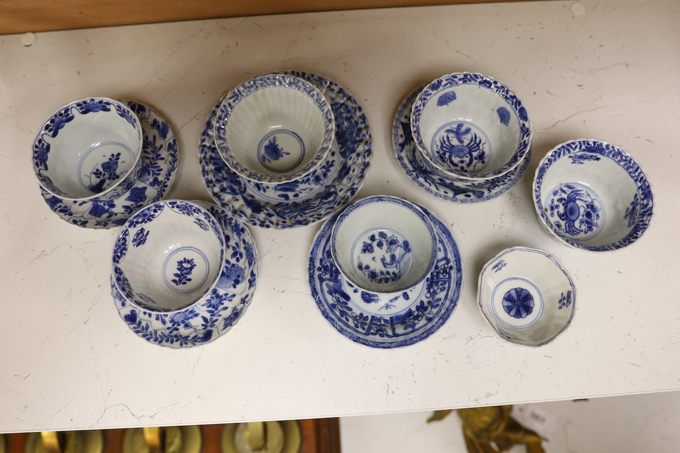 A group of seven Chinese blue and white tea bowls and five saucers, 18th-century
